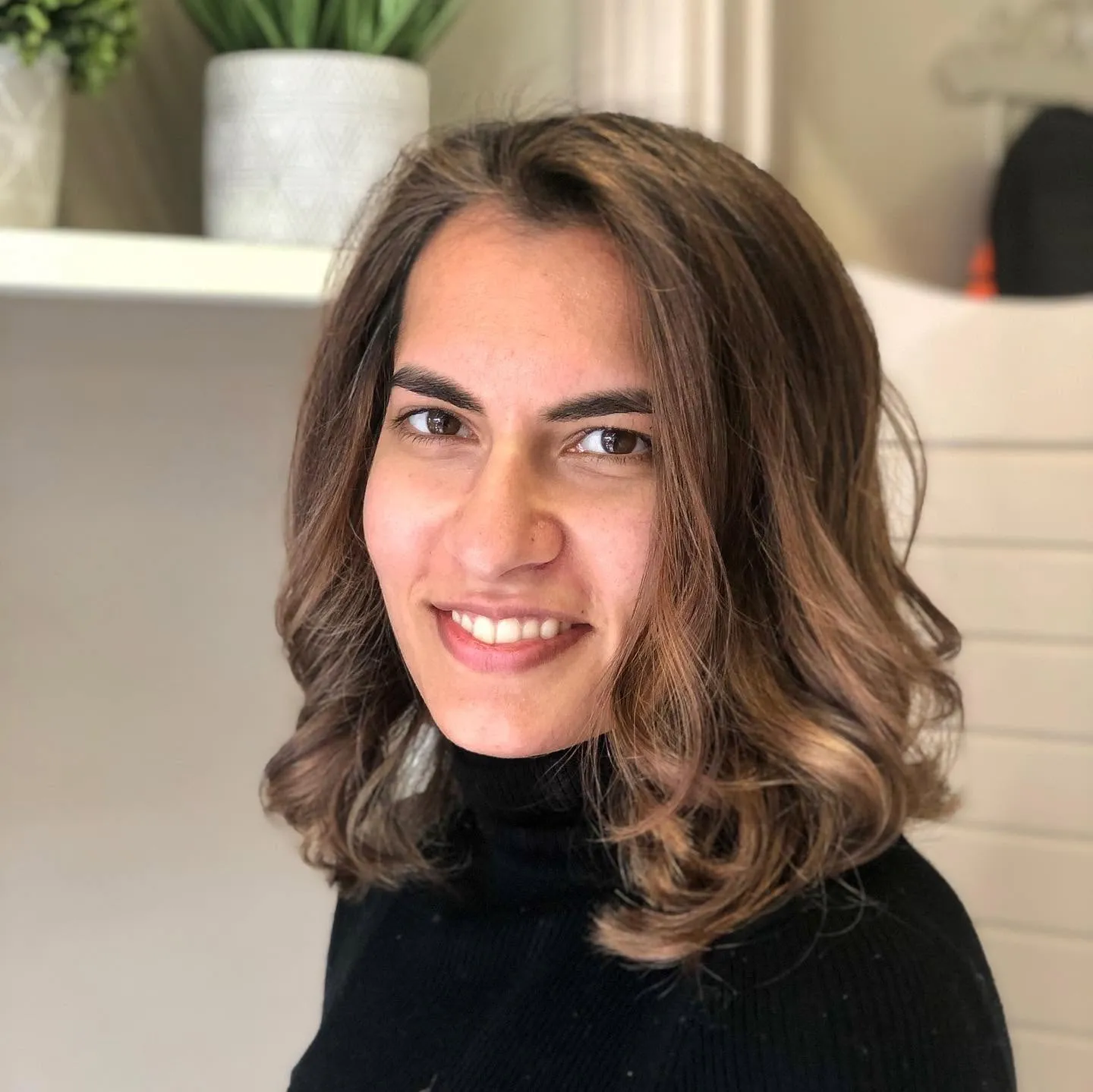 Dimensional brunette highlights with healthy shine finish